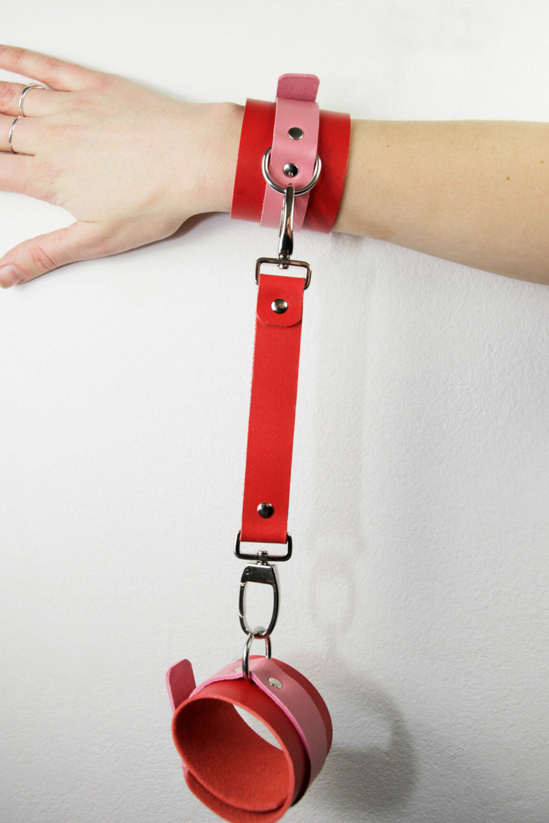 Moonbow | hand cuffs | rood/roze